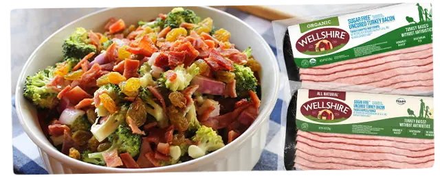 Turkey Bacon packages next to bacon topped salad
