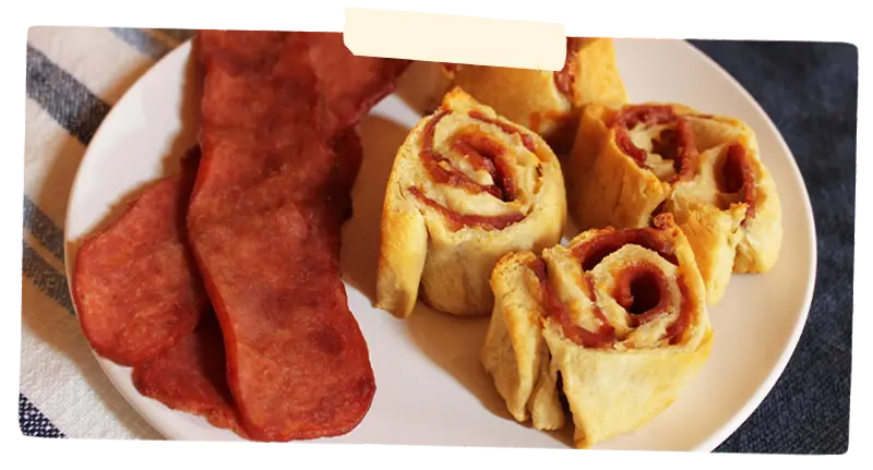Turkey Bacon next to cinnamon rolls