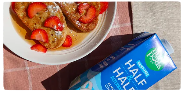 nutpods package next to french toast covered in strawberries